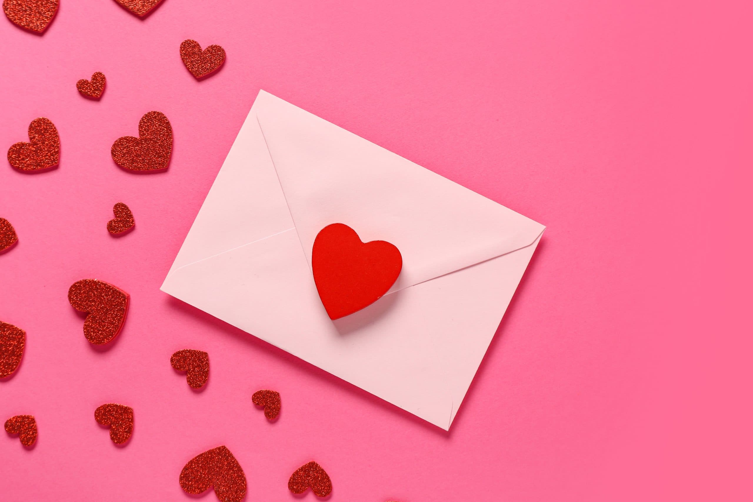 Composition,With,Envelope,And,Red,Hearts,On,Pink,Background.,Valentine’s